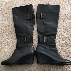 Black knee high buckle boot